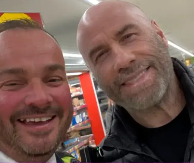 John Travolta poses for photos in Norfolk Morrisons and Wetherspoon